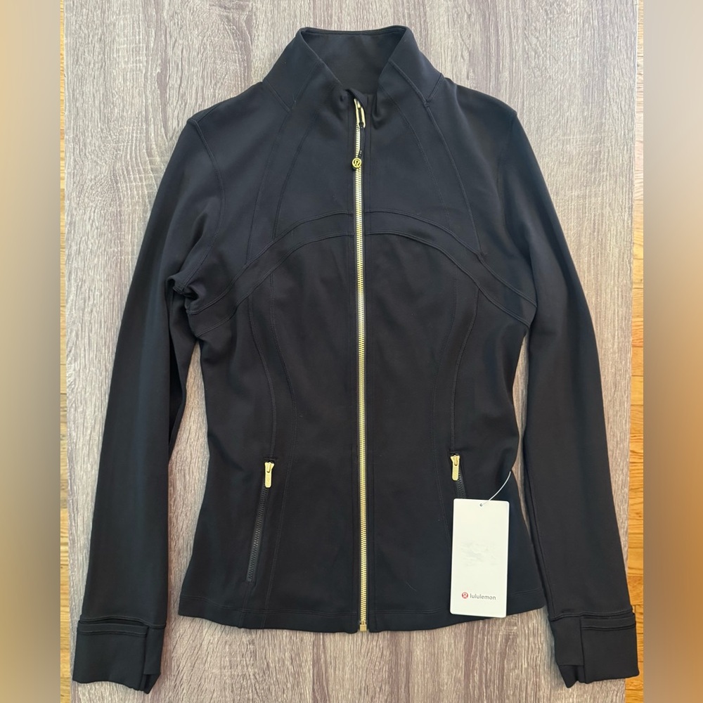 Lululemon Define Jacket Nulu. Black/Gold. Size 10. Black with gold zipper.